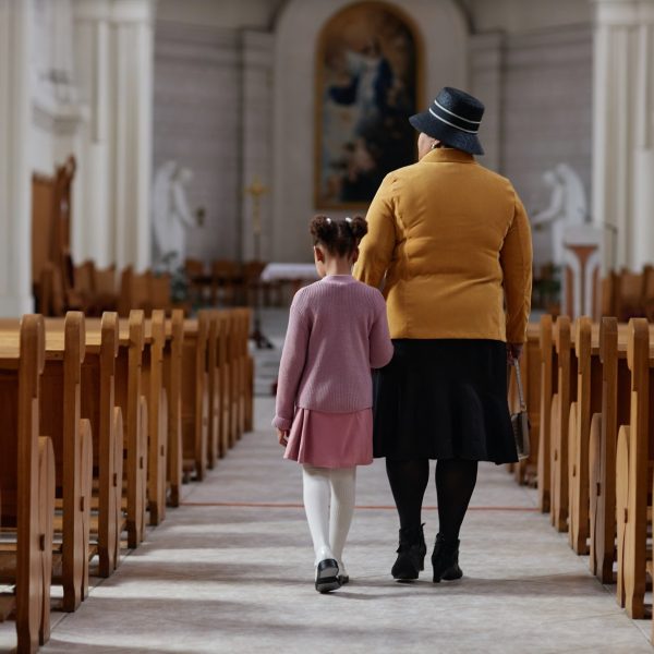 grandmother-visiting-to-church-with-little-girl.jpg